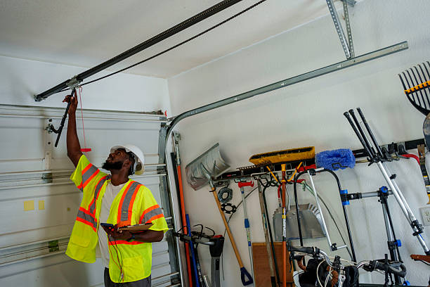 Professional Garage Door Panel Replacement technician working in McArthur, OH